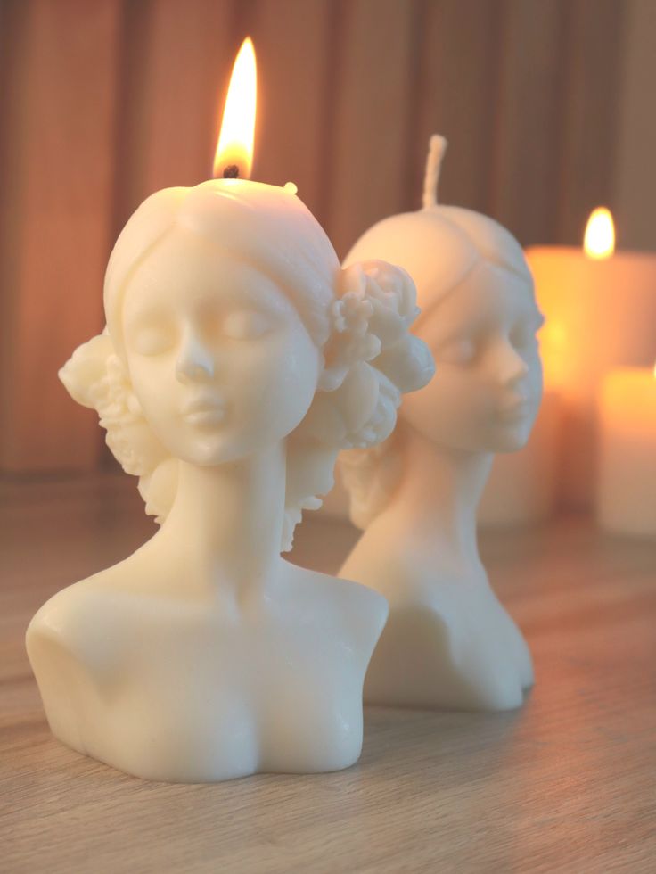 Flower lady candle with floral bun lit