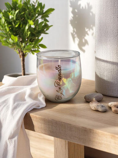 White holographic glass jar on a wooden table