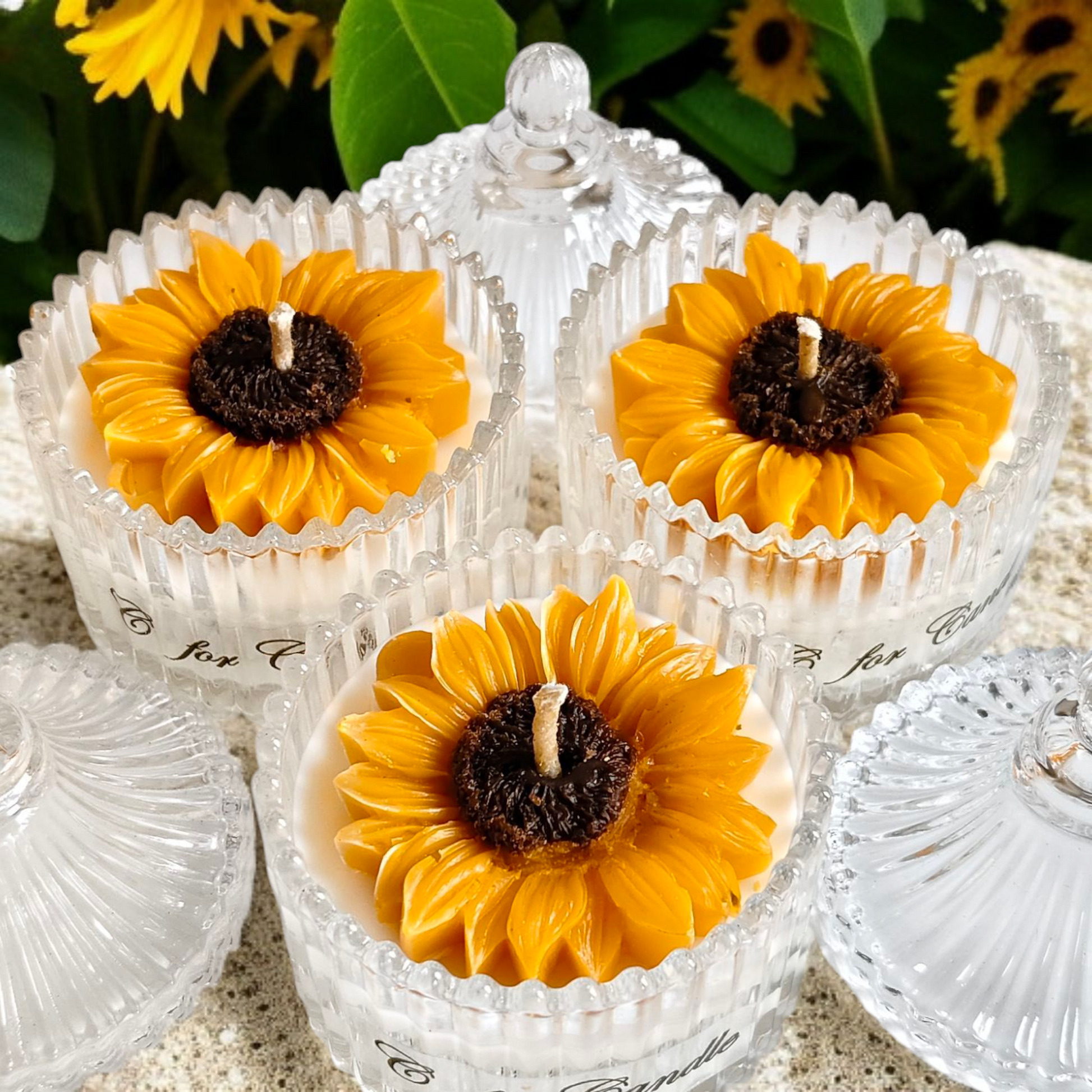 Sunflower candle in a crystal glass jar